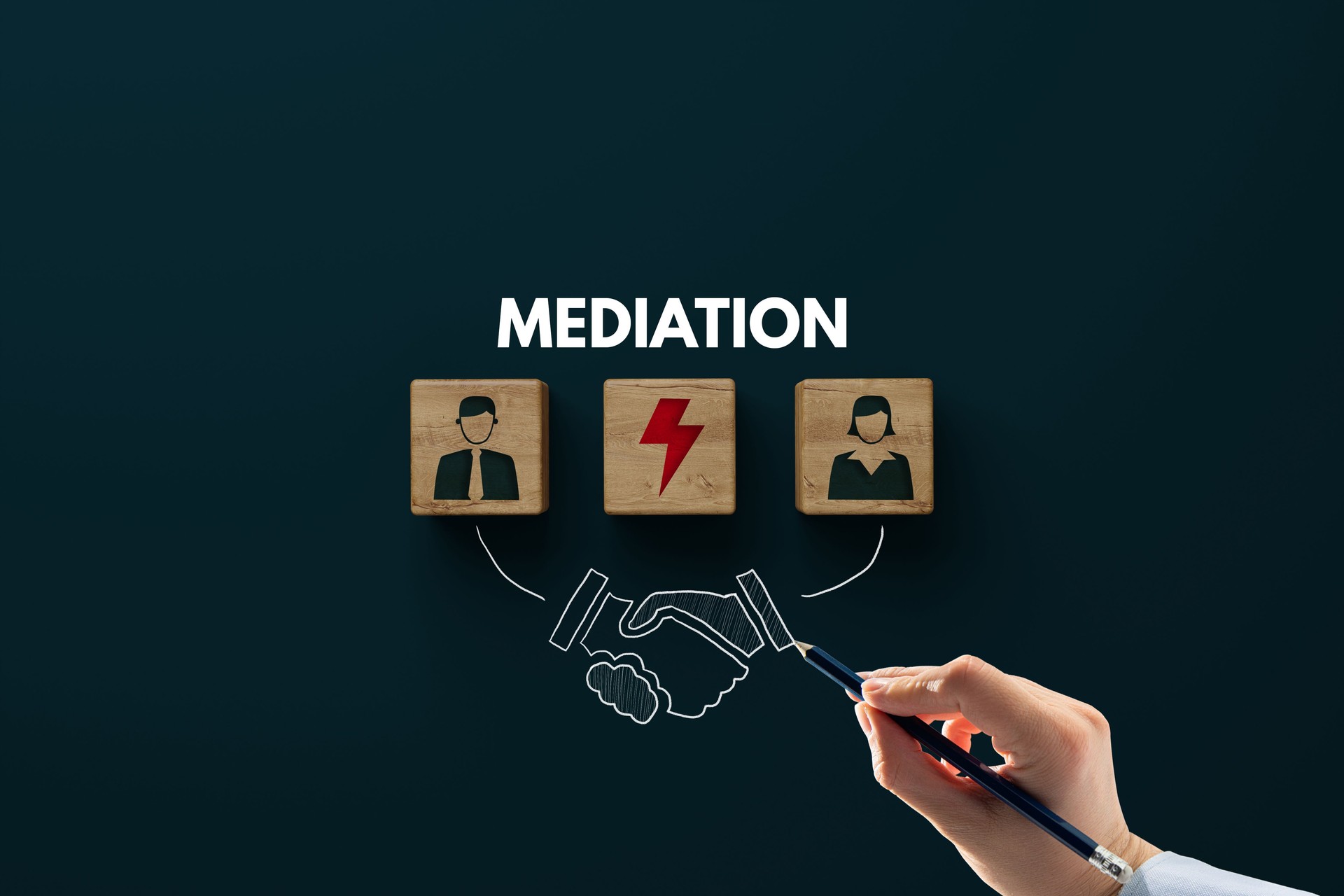 Wooden blocks with an icon of a man, woman, lightning bolt and shaking hands with consent. Divorce, mediation concept.